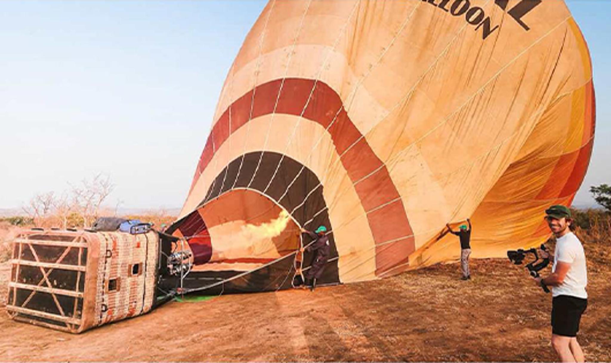 Preparing for Lift-off: Hot Air Balloon Ignition in Akagera